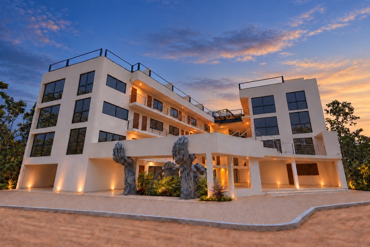 Boutique hotel building glowing at twilight