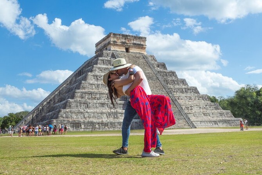 Couple at a Mayan pyramid at golden hour